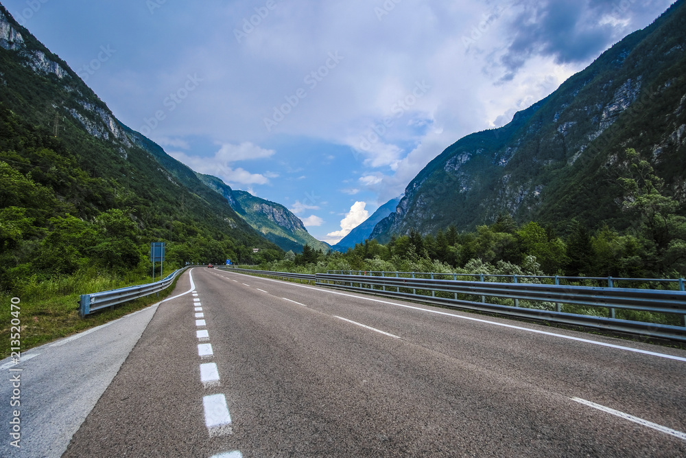 Alpine landscape with the image of road