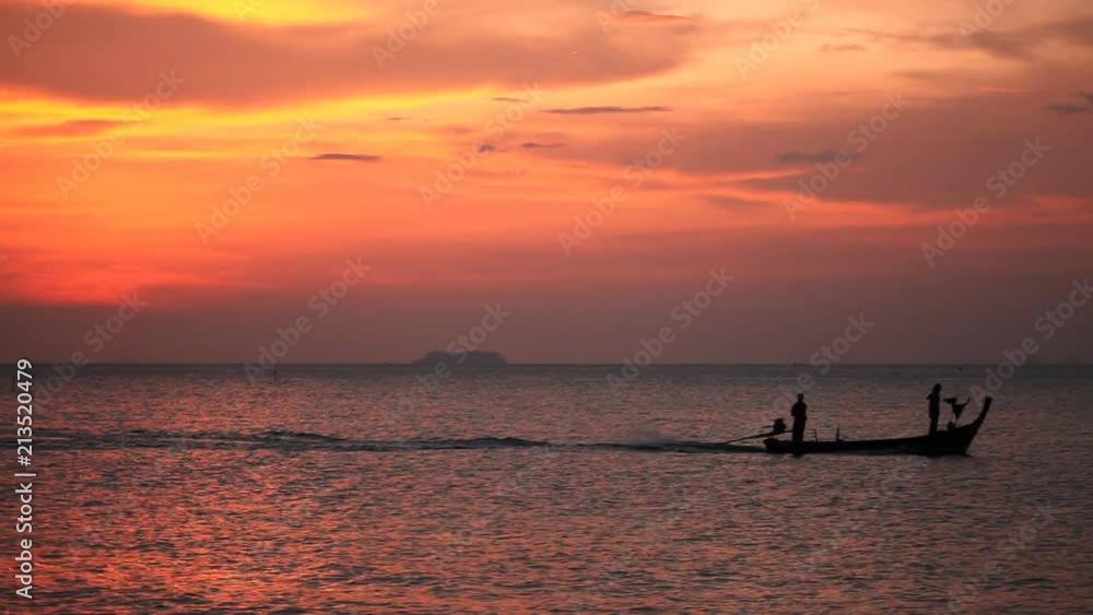Fishing boat returns back home in sunset time. Thailand Fishing boat returns back home in sunset time. Thailand