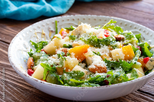 Homemade summer salad with blue cheese and honey
