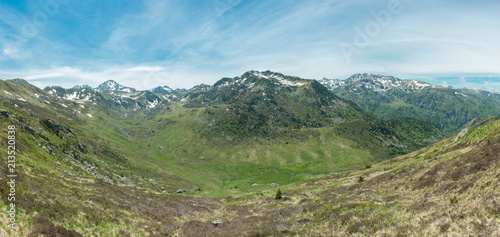Panorama of the Ruisseau le Rieutort valley in the French Pyrenees which leads up to the GR10 hiking route and the Refuge du Rulhe.