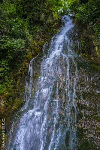 Alpine landscape with the image of waterfall