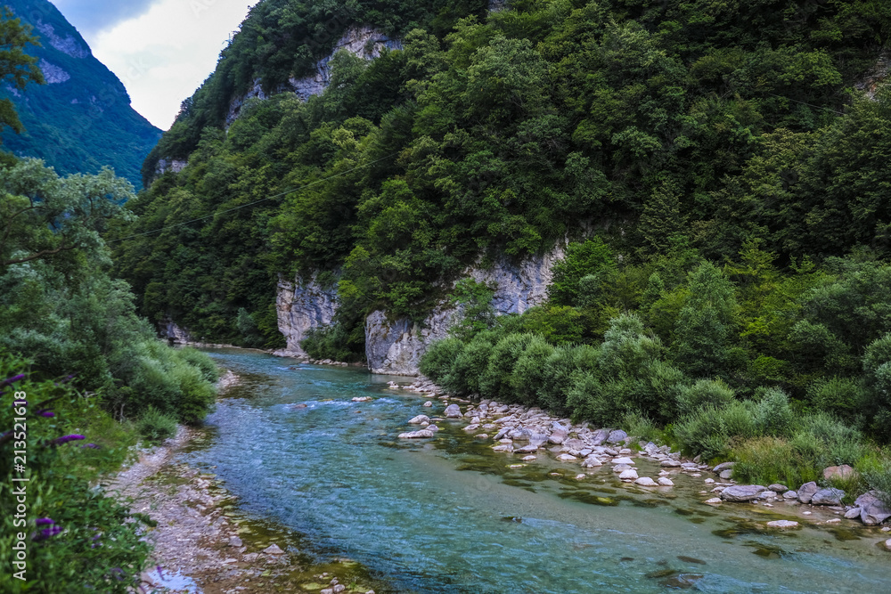 Alpine landscape with the image of Piave river