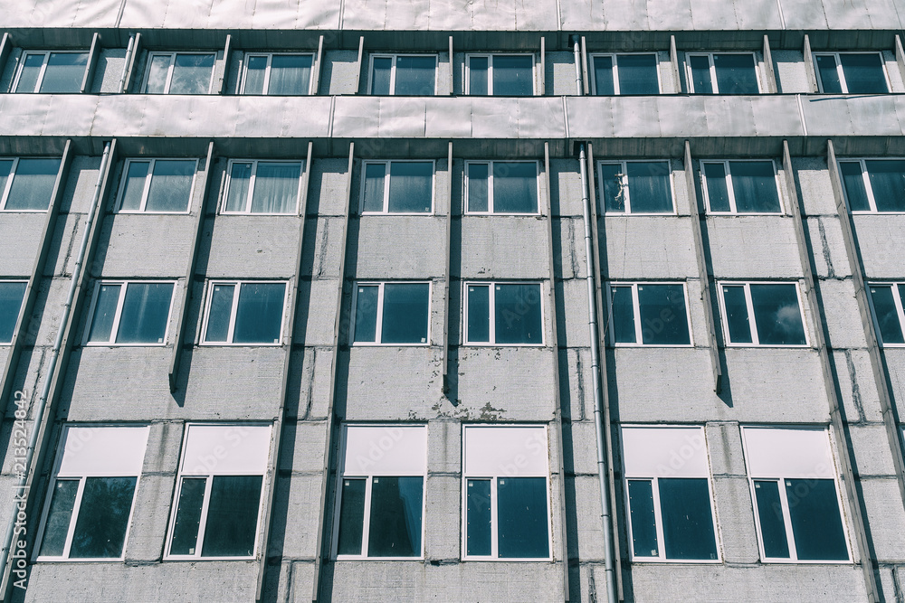 Windows on the facade of the old building Windows on the facade of the old building