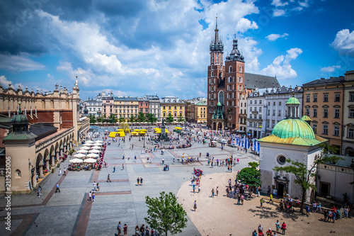 Cracow (Krakow) - Main Square (Rynek Glowny) with Marketplace (Sukiennice), Adam Mickiewicz Monument, church of Saint Mary (Kosciol Mariacki) and church of Saint Adalbert - window view