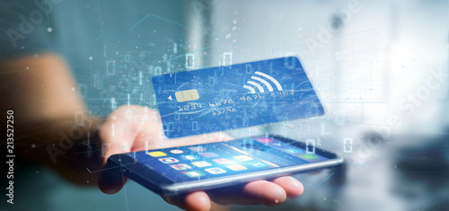 Obraz na płótnie Man holding a contactless credit card payment concept 3d rendering w salonie