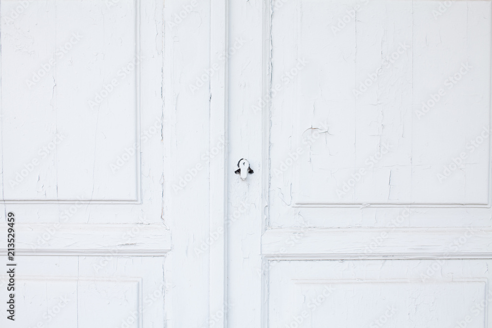 White wall and wooden door, background texture White wall and wooden door, background texture