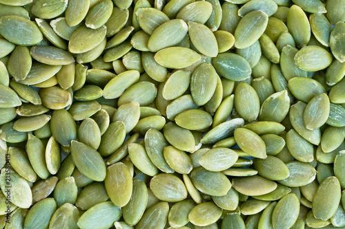 Wallpaper Mural Peeled pumpkin seeds background. Top view Torontodigital.ca