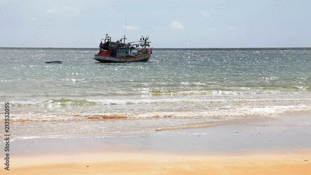 Boats in the tropical sea near the beach Boats in the tropical sea near the beach