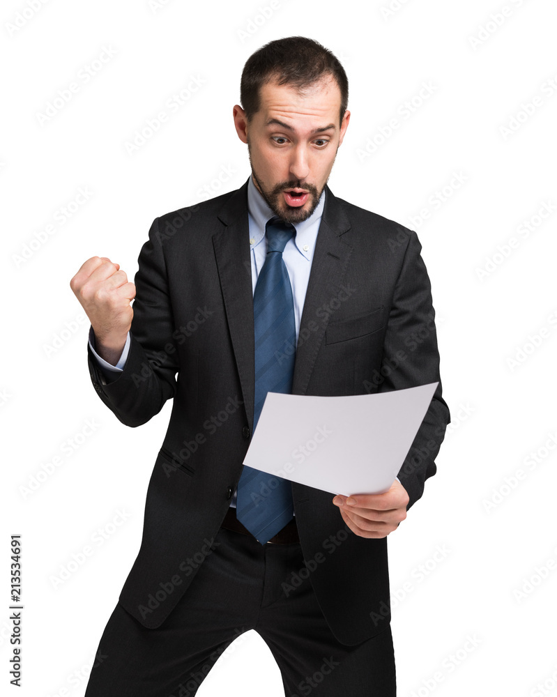 Happy businessman holding a document Happy businessman holding a document