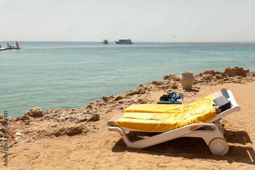 Half turn view chaise longues on the beach beach chaise longues Half turn view chaise longues on the beach beach chaise longues