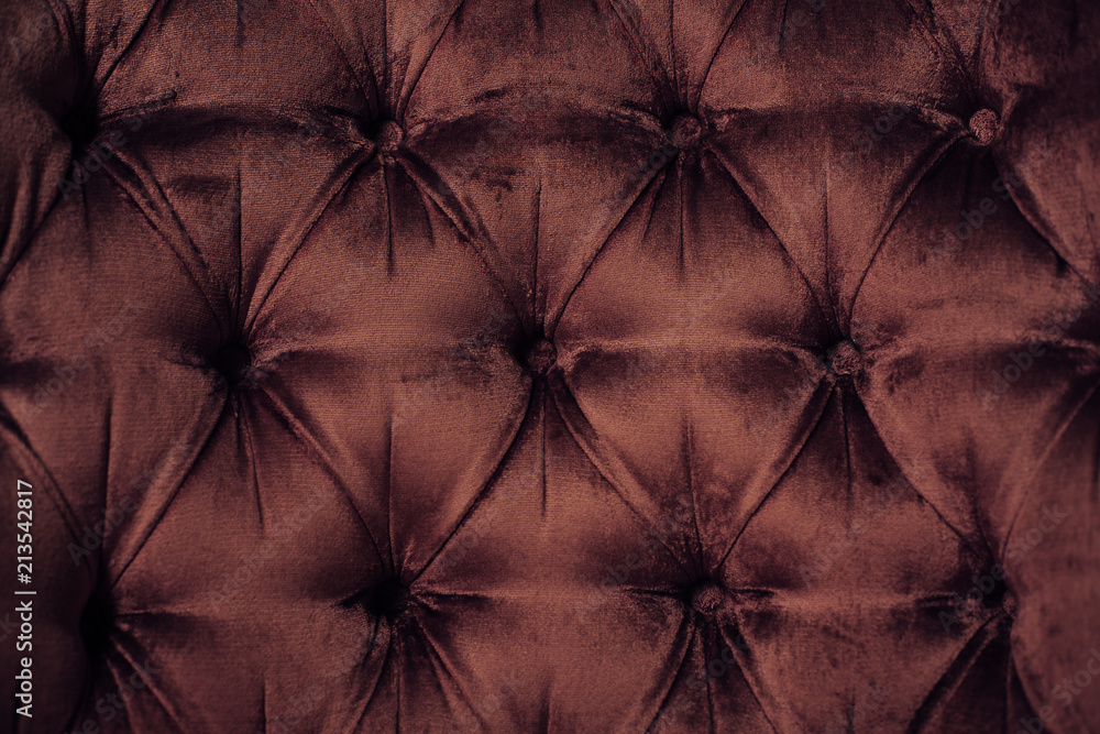 Fototapeta premium close up of a turquoise velvet sofa
