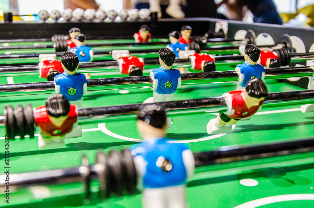Fototapeta premium Table football, soccer player figures on metal rods
