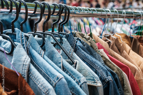 Jeans jackets and retro shirts on second hand market /  flea market - vintage clothing