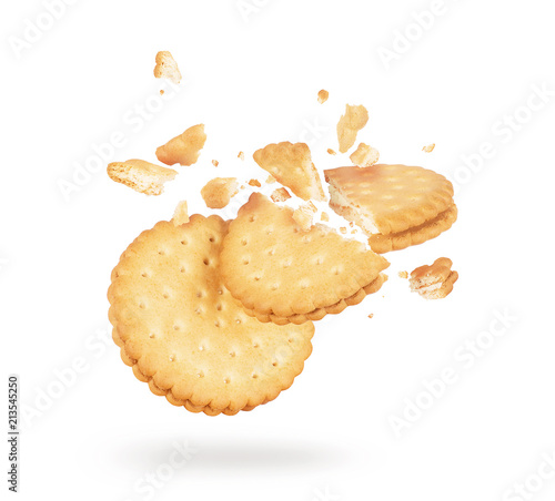 Leinwand Poster Biscuits crushed into pieces close-up isolated on a white background