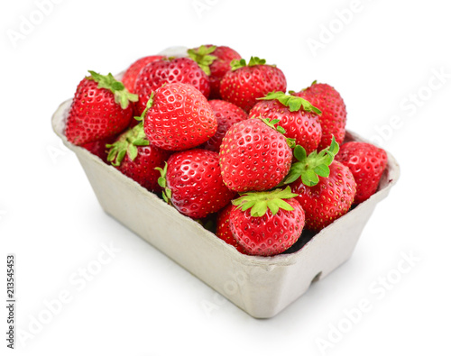 Fresh strawberry in a paper carton photo