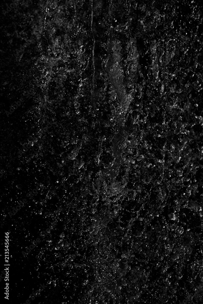 Abstract water drops against black background