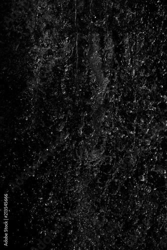 Abstract water drops against black background