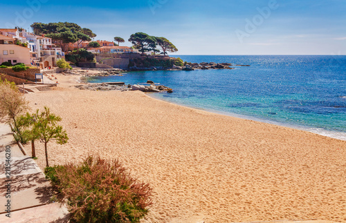 Sea landscape with Calella de Palafrugell, Catalonia, Spain near of Barcelona. Scenic fisherman village with nice sand beach and clear blue water in nice bay. Famous tourist destination in Costa Brava © oleg_p_100