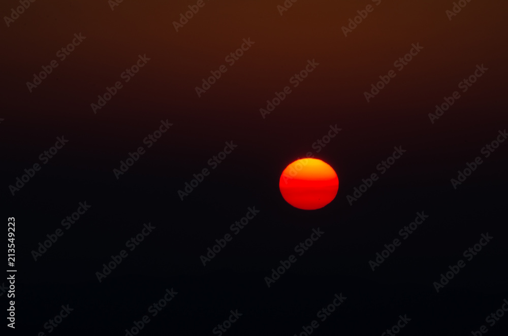 The sun just before a hazy fall sunset The sun just before a hazy fall sunset