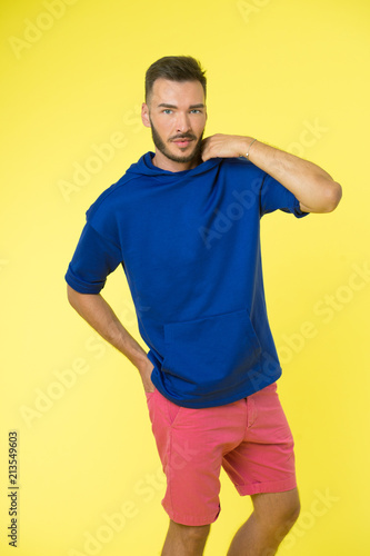 Active concept. Active lifestyle. Man in active wear on yellow background. Be active in style