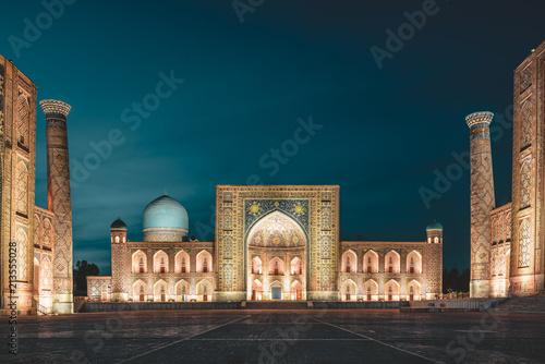 View to Registan Square at Night in Samarkand Uzbekistan photo