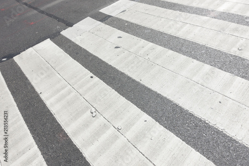city street walkway crossing white lines asphalt tarmac 