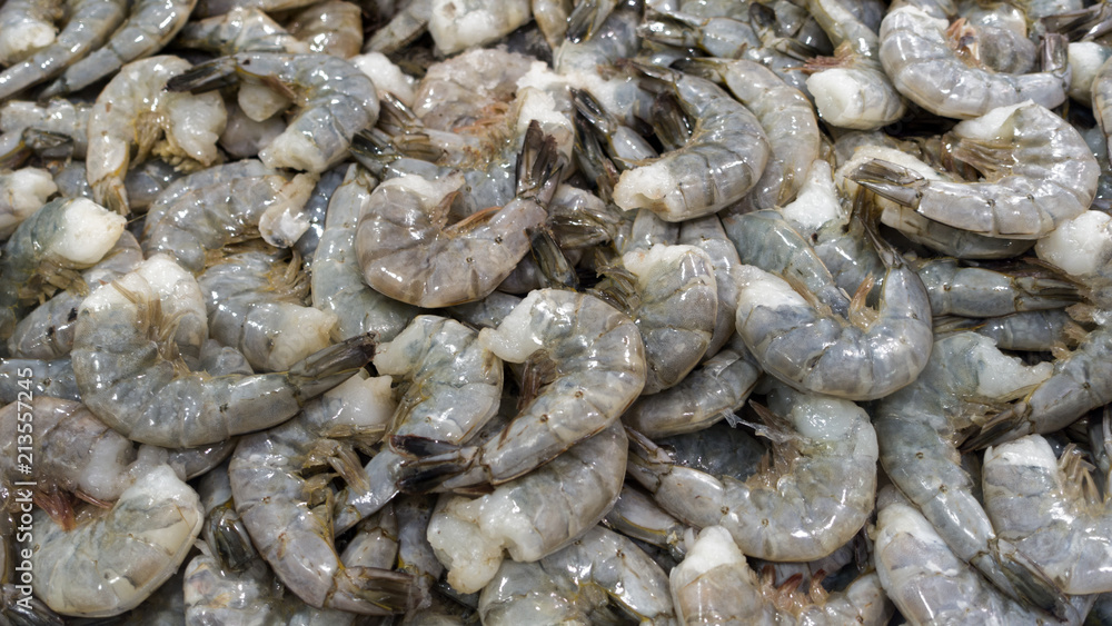 lots of fresh raw uncooked shrimp lots of fresh raw uncooked shrimp