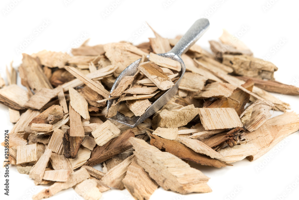 Pile of shredded wood chips for smoking meats Pile of shredded wood chips for smoking meats