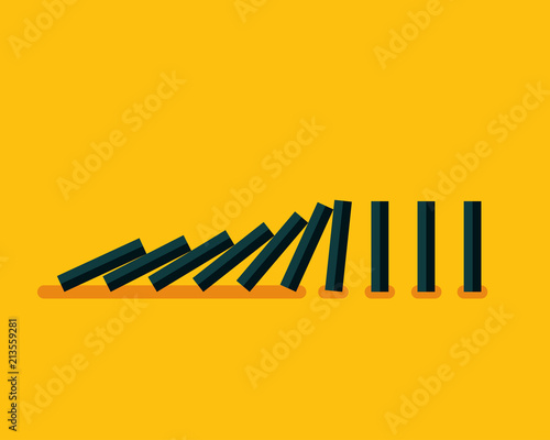 Falling black dominoes on yellow background 