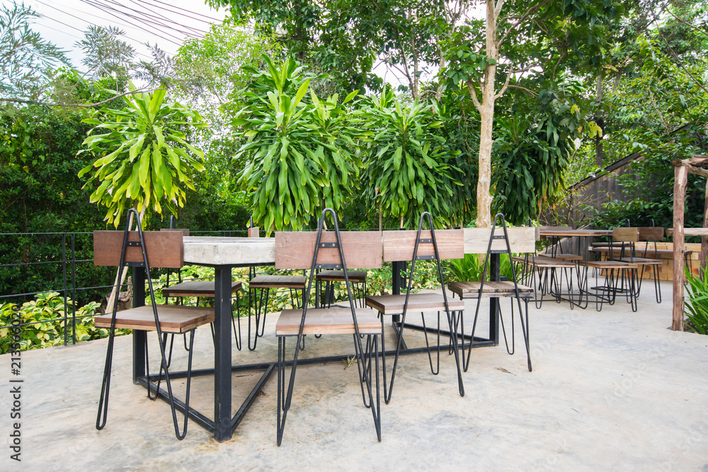 Outdoor coffee corner, Outdoor chairs and tables at the coffee shop 