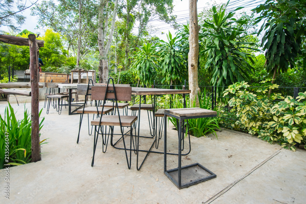 Outdoor coffee corner, Outdoor chairs and tables at the coffee shop 