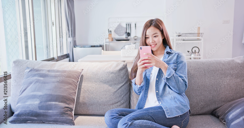 woman use phone happily woman use phone happily