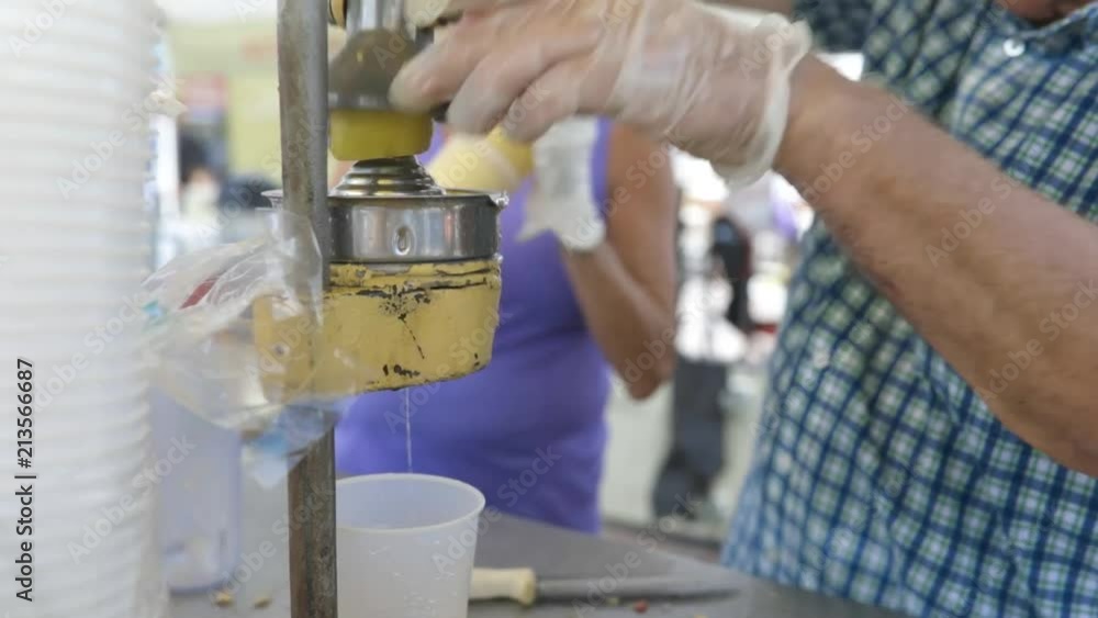Juicing lemons for lemonade Juicing lemons for lemonade