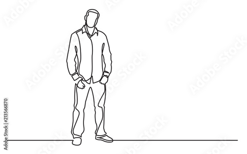 continuous line drawing of standing young guy in shirt and jeans