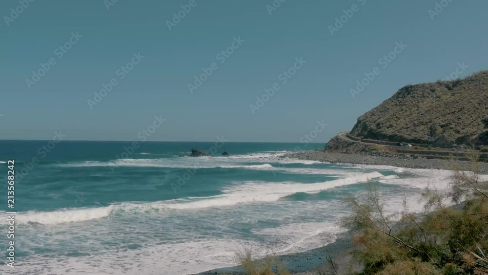 A lonely beach in Tenerife with small waves A lonely beach in Tenerife with small waves