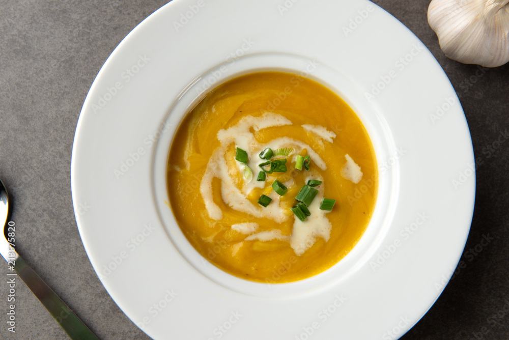 roasted pumpkin soup with herbs top view roasted pumpkin soup with herbs top view