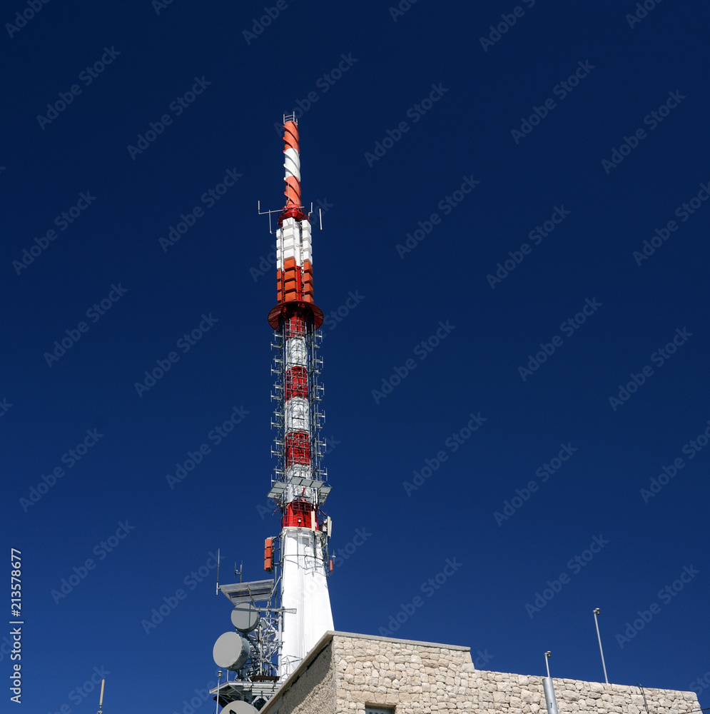 Mobile telecommunication tower or cell tower with antennae and electronic communications equipments Mobile telecommunication tower or cell tower with antennae and electronic communications equipments