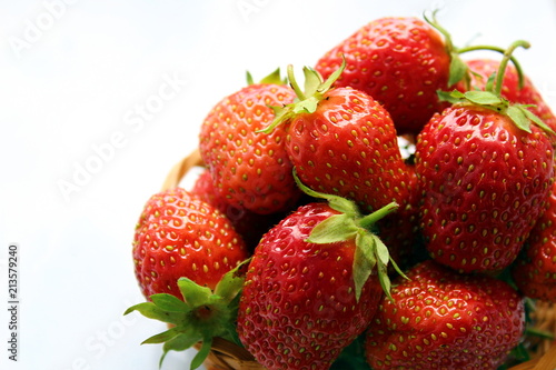 small basket of delicious juicy ripe strawberries