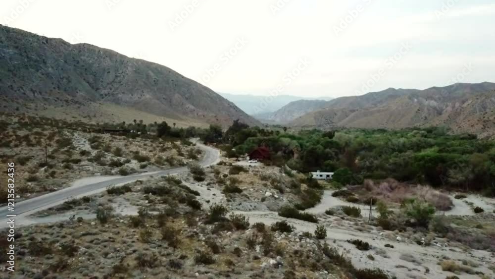 Approach shot of an Airbnb rental cabin near an oasis in Whitewater Preserve near Palm Springs, California. Approach shot of an Airbnb rental cabin near an oasis in Whitewater Preserve near Palm Springs, California.