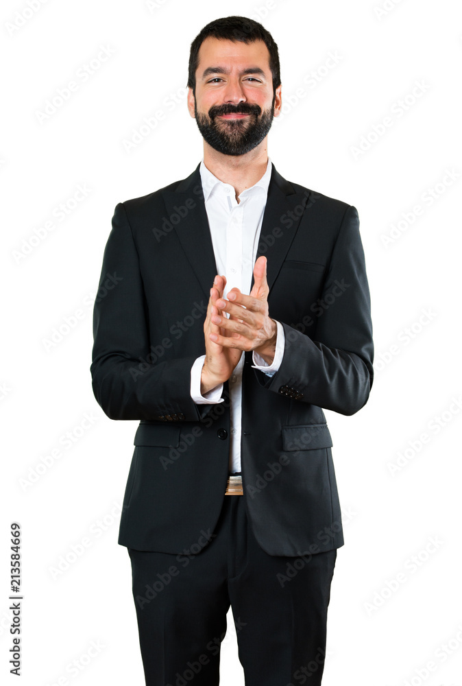 Handsome businessman applauding Handsome businessman applauding
