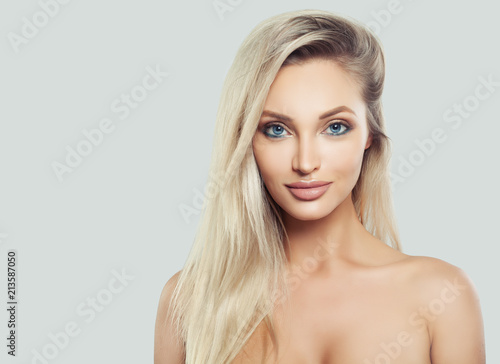 Natural Beauty. Young Woman with Fresh Skin and Healthy Blonde Hair. Facial treatment. Cosmetology, beauty, haircare and spa
