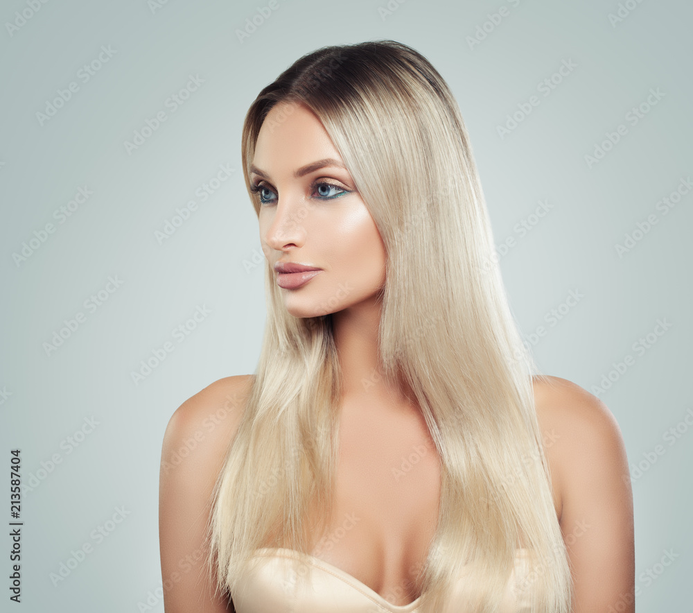 Naklejka premium Beautiful Woman with Fresh Skin and Healthy Blonde Hair. Facial treatment. Cosmetology, beauty, haircare and spa