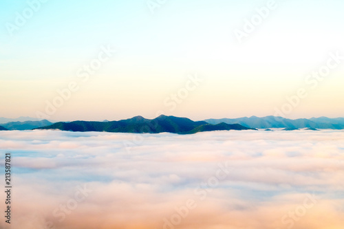 Mountain peaks jutting out from the sea fog