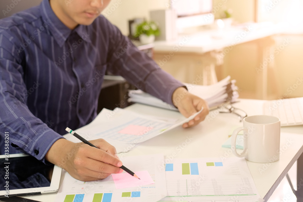 Man working on spreadsheet document financial data,Certified public accountant. Man working on spreadsheet document financial data,Certified public accountant.