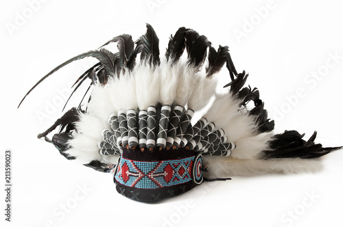 Indian cap with feathers isolated on white background