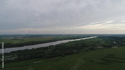 Wallpaper Mural  Aero view of the river, green meadow, cloudy sky Torontodigital.ca