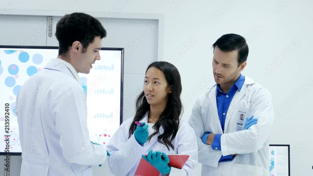 Group of Scientist working together at lab. People with science concept. 4K Resolution. Group of Scientist working together at lab. People with science concept. 4K Resolution.