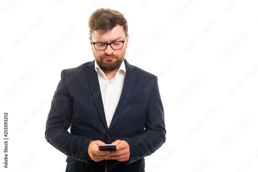 Portrait of business man texting on the smartphone. Portrait of business man texting on the smartphone.