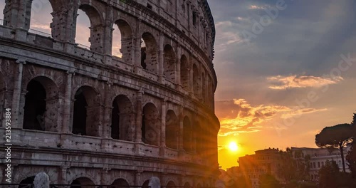 Rome Colosseum Sunrise on the Horizon. Colosseum Sunrise Landmark in City Center Timelapse 4K. 