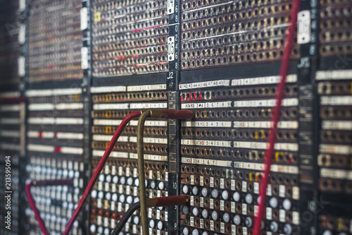Selective focus, old fashioned manual telephone exchange switchboard photo